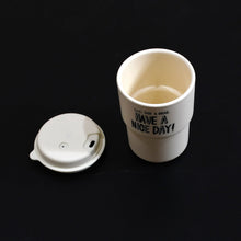 Coffee cup with motivational design, portable and suitable for both travel and office use.