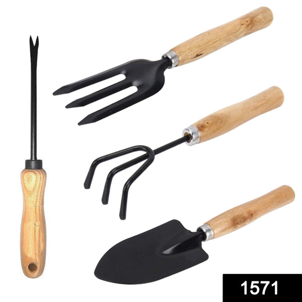 Gardening tools set with spade, trowel, and pruning shear.